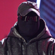 Kanye West with his face completely covered